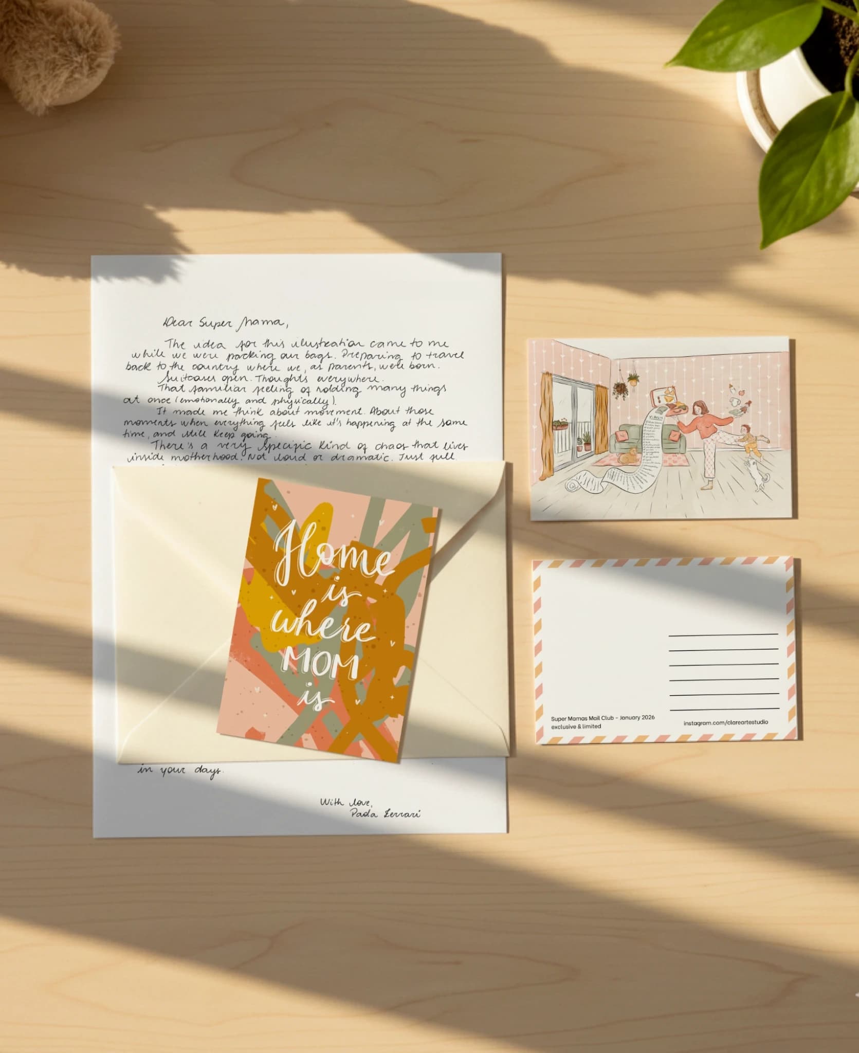 Hand holding illustrated postcard